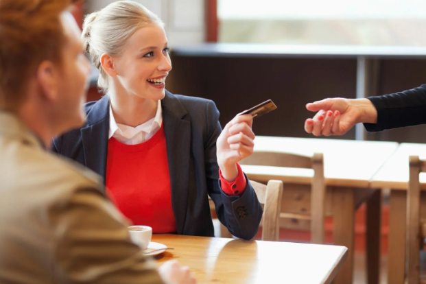 Woman paying bill